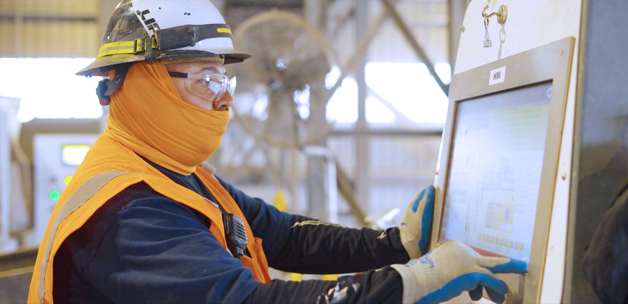 worker touching panel