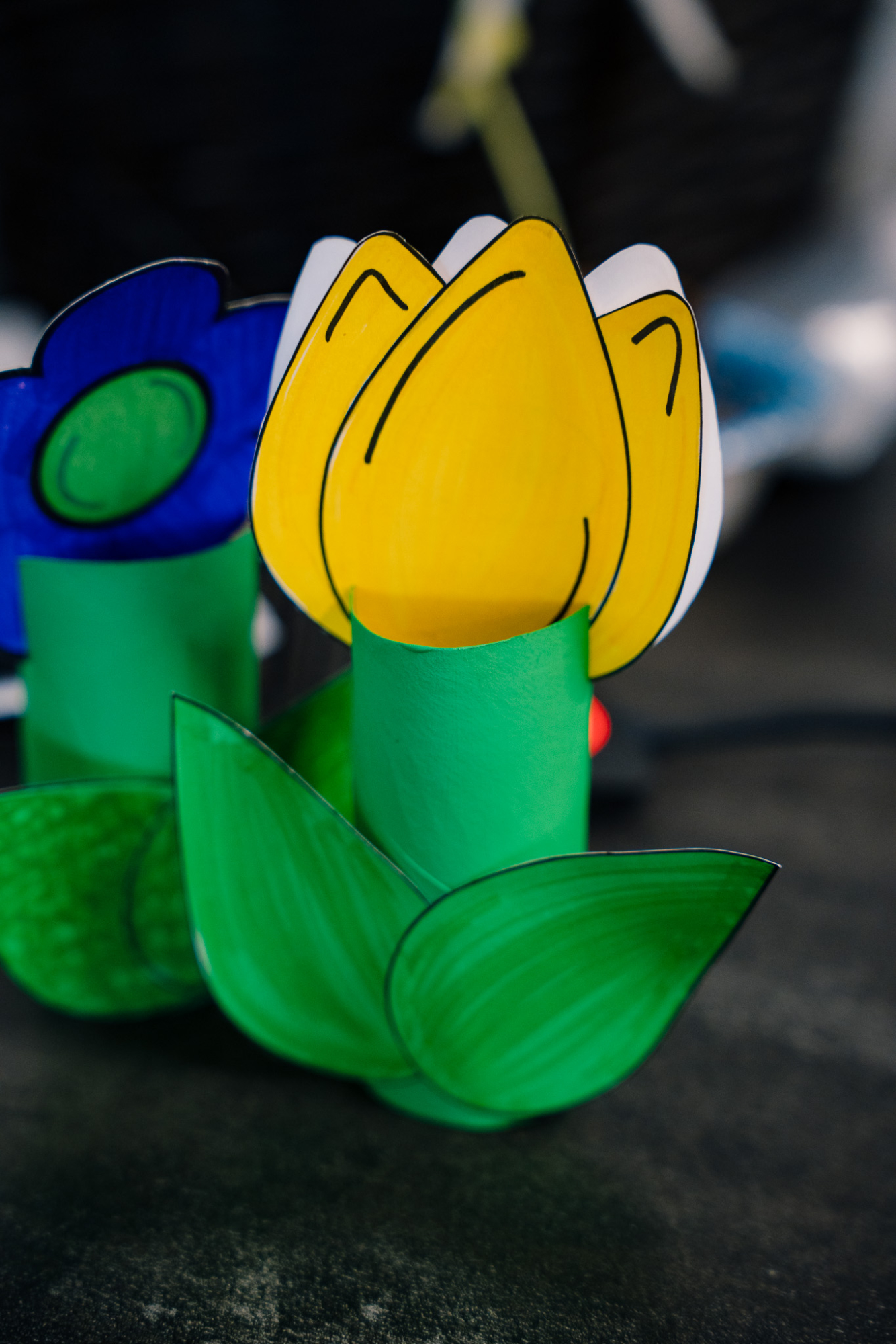 upcycled cardboard paper craft flowers made from colored paper and toilet paper rolls